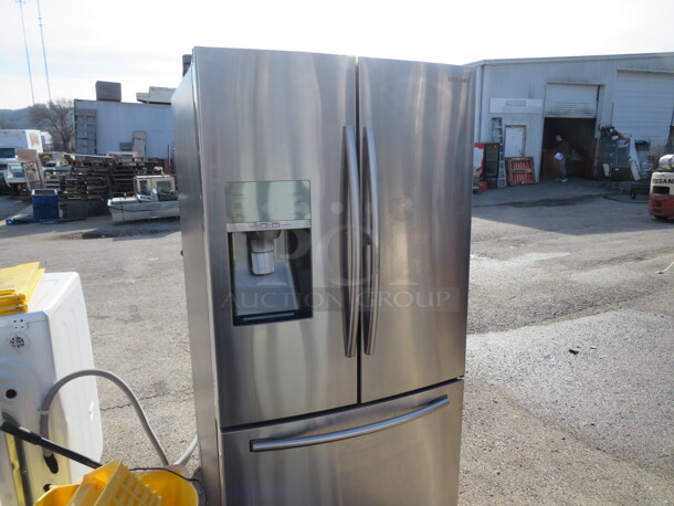 One Stainless Steel Samsung French Door Refrigeratro/Freezer. Model# AW4-3D-AW2-14. 36X34X68.5. Refrigerator/Freezer IS WORKING!!!  The Ice Maker Does NOT Work.