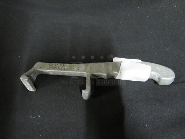 One Aluminum Bucket Opener. - Image 1 of 1