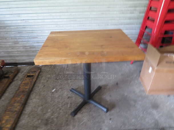 One 2 Inch Thick Solid Wooden Table Top On A Pedestal Base. 24X30X30 - Image 1 of 2