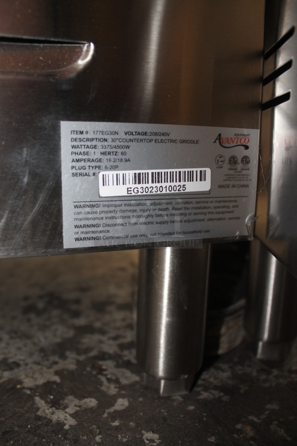 BRAND NEW SCRATCH AND DENT! Avantco 177EG30N Stainless Steel Commercial Countertop Electric Powered Flat Top Griddle w/ Thermostatic Controls. 208/240 Volts, 1 Phase.  - Image 7 of 7