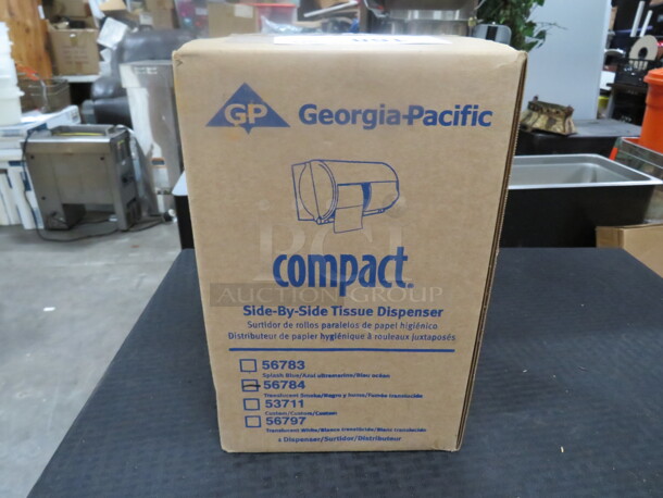 One NEW Georgia Pacific Compact Side By Side Tissue Dispenser. # 56784.