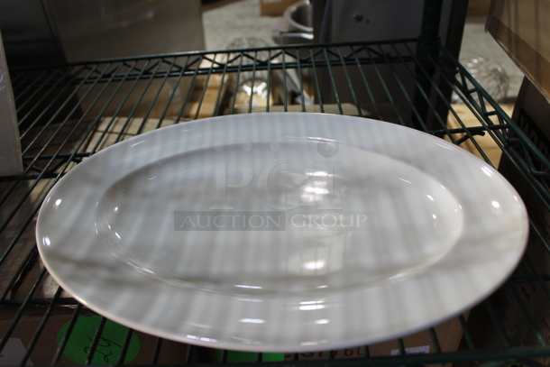 2 Boxes of 12 BRAND NEW! White Ceramic Oval Plates. 2 Times Your Bid! - Image 1 of 3