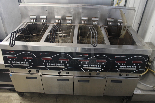 2021 Henny Penny EEE-154 Evolution Elite Stainless Steel Commercial Floor Style Electric Powered 4 Bay Deep Fat Fryer. 208 Volts, 3 Phase. 