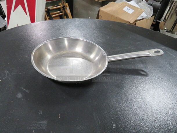 One 8 Inch Stainless Steel Saute Pan.