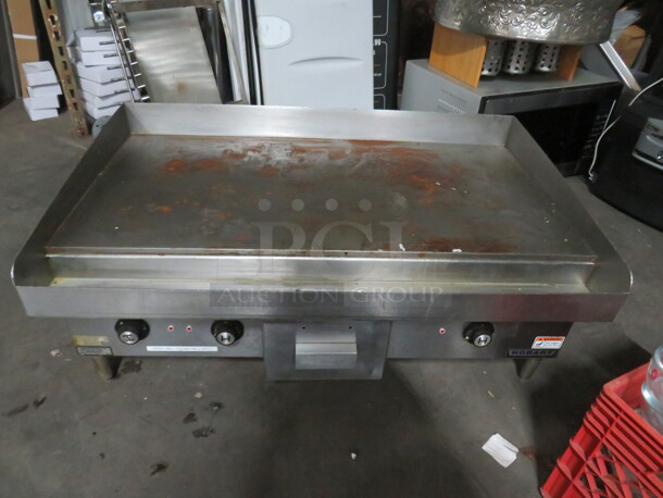 One Hobart Electric Griddle. 208-240 Volt. 1 Phase. 36X22X16. Working When Removed.