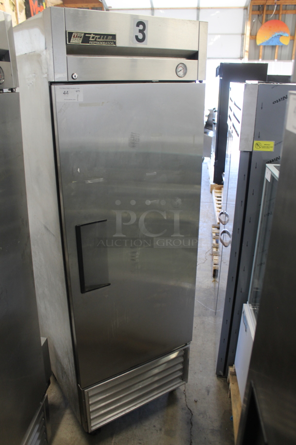 True T-23 Stainless Steel Commercial Single Door Reach In Cooler w/ Poly Coated Racks on Commercial Casters. 115 Volts, 1 Phase. Tested and Powers On But Does Not Get Cold