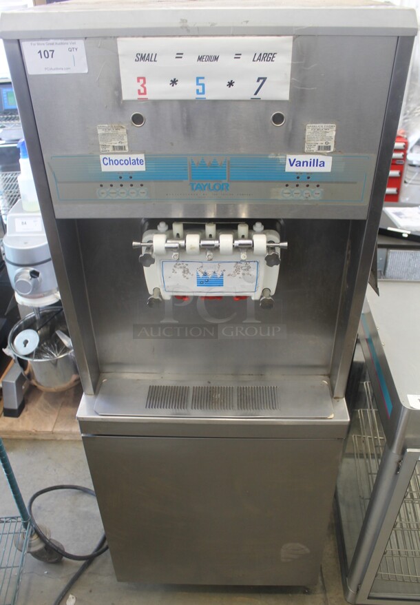 Taylor 8756-27 Stainless Steel Commercial Floor Style Water Cooled 2 Flavor w/ Twist Soft Serve Ice Cream Machine on Commercial Casters. 208-230 Volts, 1 Phase. - Image 1 of 9
