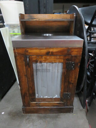 One 1 Door Trash Receptacle With Stainless Steel Top, Overshelf, And A Rubbermaid Trash Can.