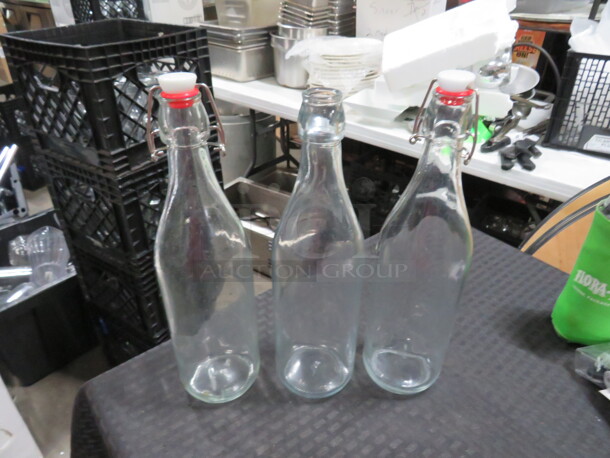 Capped Water Bottles. Missing 1 Cap. 3XBID - Image 1 of 1