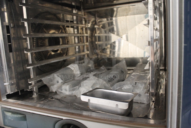 2 2013 Rational Stainless Steel Commercial Combitherm Self Cooking Center Convection Ovens on Commercial Casters. Top Model: SCC WE 62. Bottom Model: SCC WE 102. Picture of Unit Powered on is Included. 480 Volts, 3 Phase. 42x40x73. 2 Times Your Bid! - Image 6 of 9