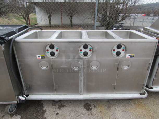 One Stainless Steel 4 Door 4 Well Hot Well With Under Food Storage On Casters. 67X30X37