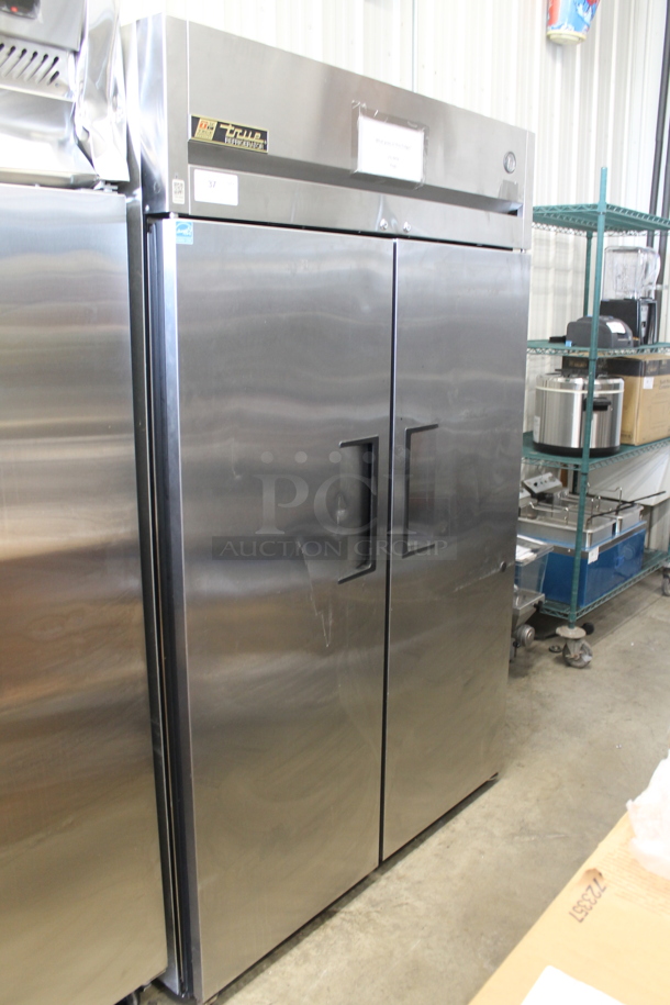 2013 True TG2R-2S ENERGY STAR Stainless Steel Commercial Two Door Reach In Cooler w/ Poly Coated Racks. Comes w/ Commercial Casters. 115 Volts, 1 Phase. Tested and Working! - Image 1 of 7