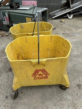 One Mop Bucket On Casters.