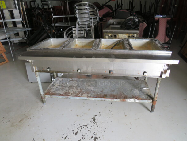 One Eagle 4 Well Steam Table With Under Shelf. Model# DHT4-120. 2000 Watt. 120 Volt. 64X30X34 - Image 1 of 1
