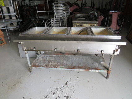 One Eagle 4 Well Steam Table With Under Shelf. Model# DHT4-120. 2000 Watt. 120 Volt. 64X30X34