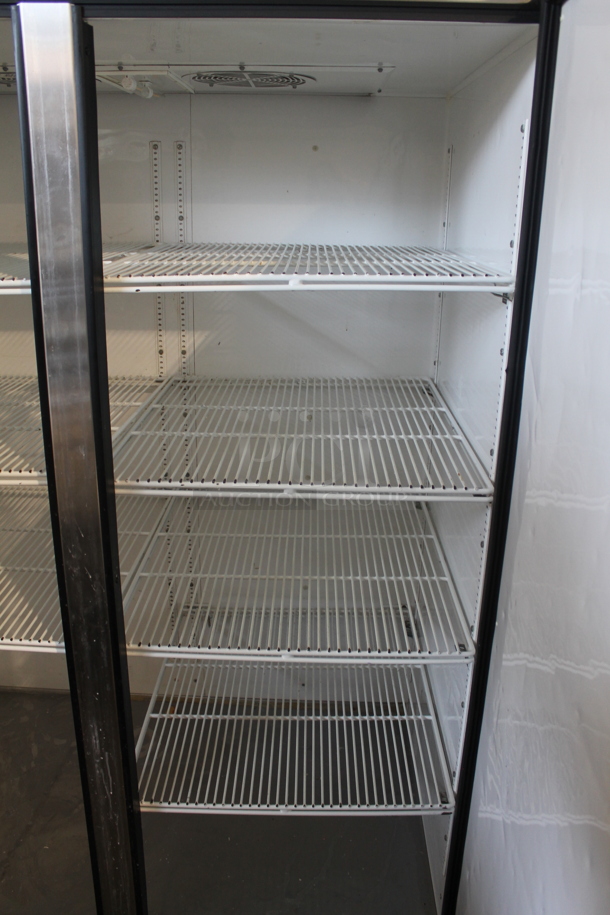 2012 True TG2R-2S ENERGY STAR Stainless Steel Commercial 2 Door Reach In Cooler w/ Poly Coated Racks on Commercial Casters. 115 Volts, 1 Phase. Tested and Working! - Image 6 of 7