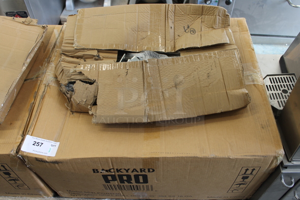 BRAND NEW SCRATCH AND DENT! 2022 Backyard Pro LPG60RD 60" Stainless Steel Liquid Propane Outdoor Grill With 2 Roll Dome Lids. Stock Picture Used as Gallery Picture. - Image 6 of 12