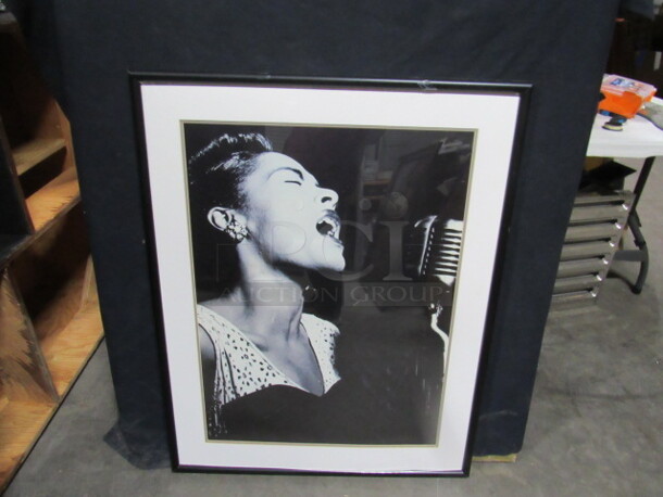 One 31X39 Framed Double Matted Billie Holiday Picture.