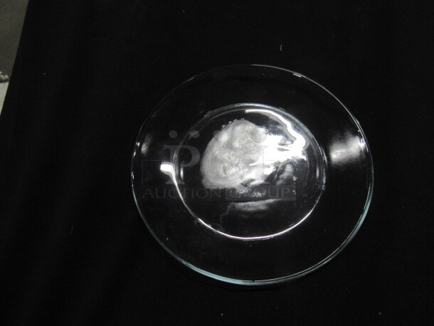 7 Inch Clear Glass Plate. 12XBID - Image 1 of 1