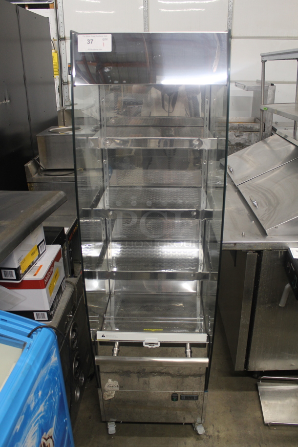 Marchia MHS220 Stainless Steel Commercial Reach In Grab N Go Merchandiser w/ Metal Shelves on Commercial Casters. 220 Volts, 1 Phase.  - Image 1 of 8