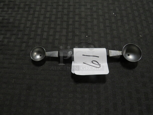 One Dual Sided Scoop. - Image 1 of 1