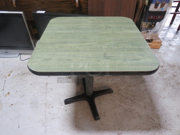 One Green Laminate Table Top On A Pedestal Base. 30X30X29 - Image 1 of 2