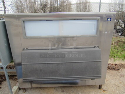 One Manitowic Ice Bin. Model# F1325. 60X31X54.5