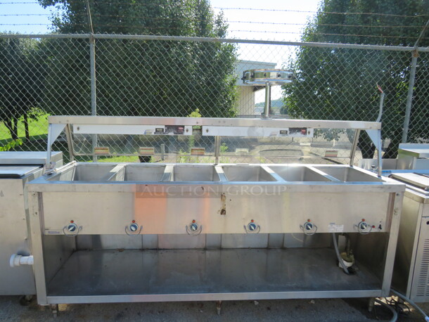 One Duke 6 Well Steam Table With Under Shelf, Over Shelf, 2 Hatco Glo Ray Food Warmers, And Sneeze Guards. 88X26X62.5 208 Volt. 3 Phase. #E6CBSS. - Image 1 of 3