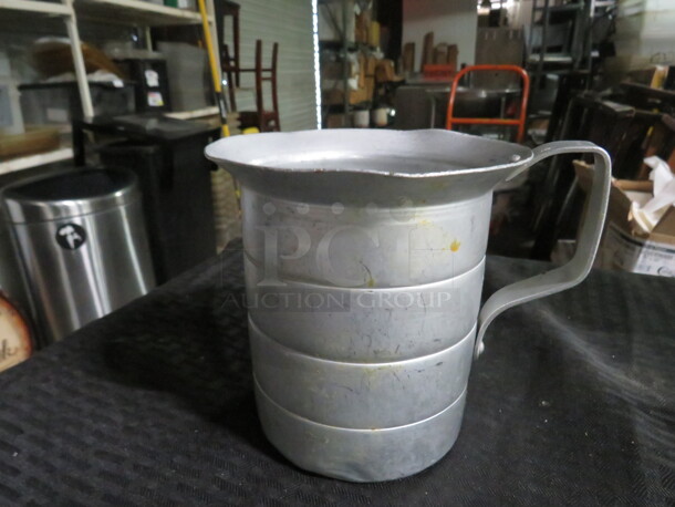 One Vollrath 1 Quart Aluminum Measurer. #68296 - Image 1 of 1