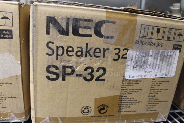 ALL ONE MONEY! Lot of Strainers, Stainless Steel Masher, Steel Drop In Bins, Hand Mixers, Small Steel Pot, Cuisinart Food Processor, Muffin Baking Sheets, Coffee Maker, Heart Shaped Wicker Basket, Salt And Pepper Shakers, Christmas Decorations, 2 Boxes Of NEC SP-32 Speakers AND MORE! Does Not Include Metro Shelf. - Image 12 of 12