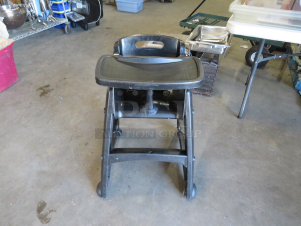 One Black Poly High Chair On Casters.