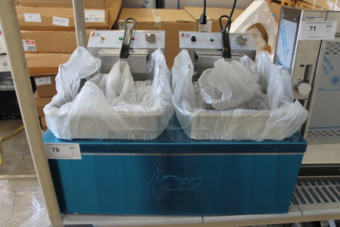 BRAND NEW SCRATCH AND DENT! Cooking Performance Group CPG DF-18-2 Stainless Steel Commercial Countertop Electric Powered 2 Bay Fryer w/ 2 Metal Fry Baskets. 208-240 Volts, 1 Phase. 