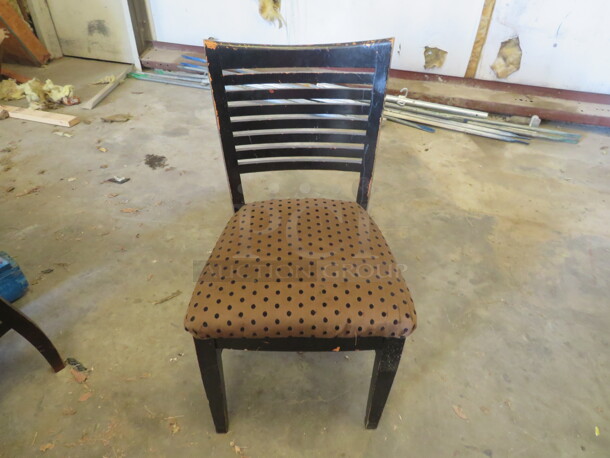 Wooden Chair Painted Black With A Cushioned Seat. 4XBID 