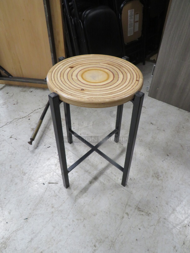 One Black Metal Bar Height Stool With A Wooden Seat.  - Image 1 of 2
