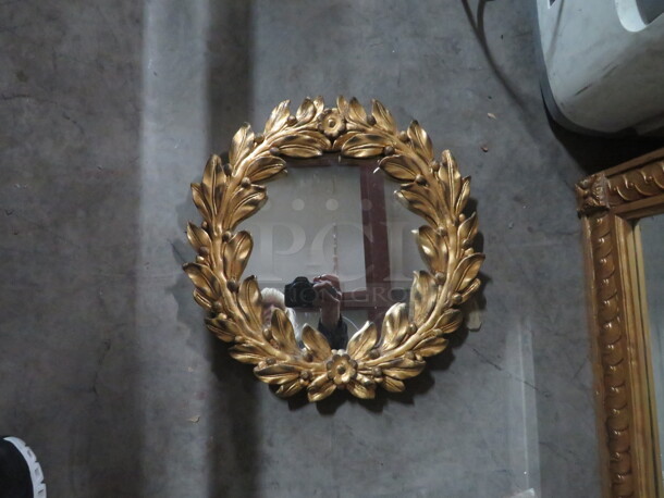 One 15 Inch Round Vintage Gold Framed Mirror.