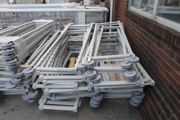 ALL ONE MONEY! PALLET LOT of BRAND NEW! Gray Poly Transport Rack Frames on Commercial Casters. Includes 21x2.5x75