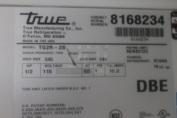 2014 True TG2R-2S ENERGY STAR Stainless Steel Commercial Two Door Reach In Cooler w/ Poly Coated Racks on Commercial Casters. 115 Volts, 1 Phase. Tested and Working! - Image 5 of 5