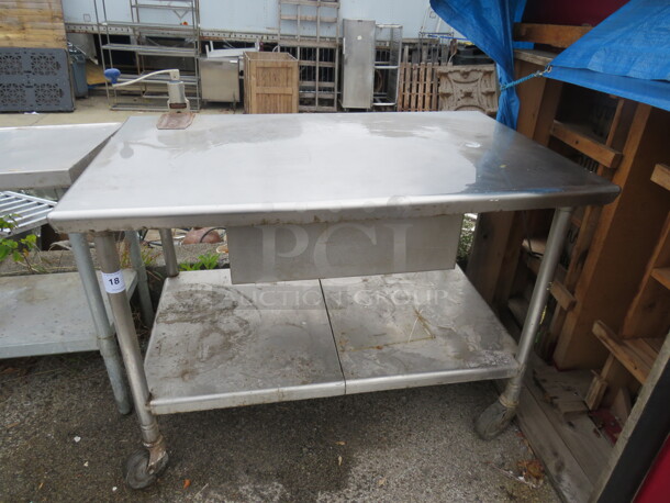 One Stainless Steel Table With A 10lb Can Opener, And Under Shelf, On Casters. 48X30X34