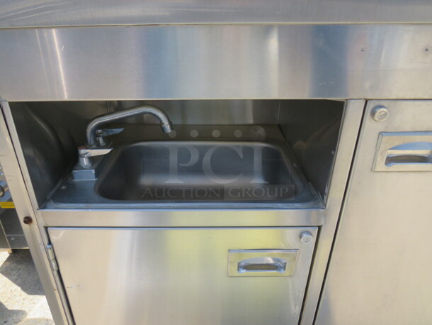 One Stainless Steel Workstation/Kiosk With Handsink, Faucet And Hot Water Heater, 2 Doors With Under Storage, 1 Door Cooler, Cash Drawer, and Flip Up SS Shelf, On Casters. 85X33X61 - Image 3 of 4