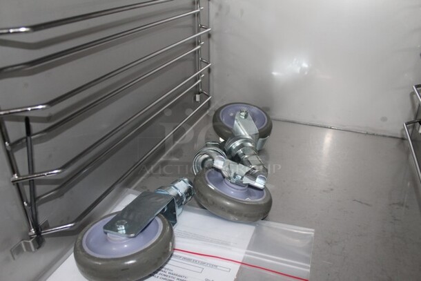 BRAND NEW! 2022 Alto Shaam 1000-UP Stainless Steel Commercial 2 Half Size Door Reach In Warming Holding Cabinet. Comes w/ 3 Commercial Casters. 120 Volts, 1 Phase. Stock Picture Used As Gallery. Tested and Working! - Image 6 of 12