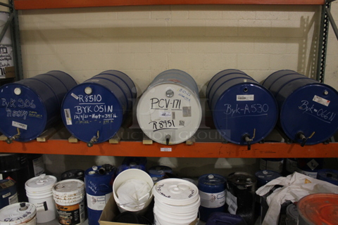 ALL ONE MONEY! Lot of 5 Metal Barrels of Various Contents w/ Spigots. BUYER MUST REMOVE.