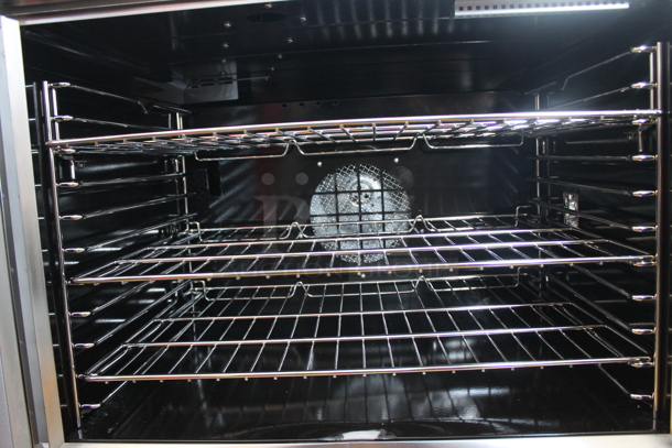 BRAND NEW SCRATCH AND DENT! Cooking Performance Group CPG 351FEC100D Stainless Steel Commercial Single Deck Standard Depth Full Size Electric Convection Oven w/ View Through Doors, Metal Oven Racks and Thermostatic Controls. Comes w/ Legs. 240 Volts, 1 Phase. - Image 7 of 8