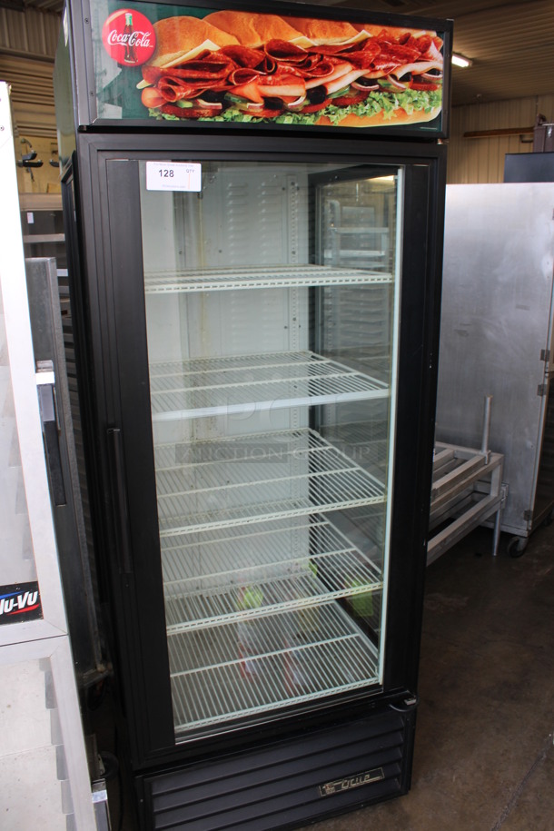 True Model GEM-26 Metal Commercial Single Door Reach In Cooler Merchandiser w/ Poly Coated Racks. 30x30x79. Tested and Powers On But Temps at 51 Degrees