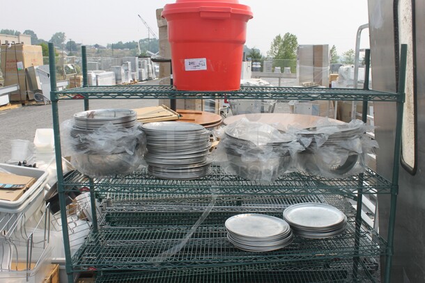 ALL ONE MONEY! Lot of Items Including Metro Shelf With Red Salad Spinner, Aluminum/Steel Plates And Bowls. BUYER MUST DISMANTLE. PCI CANNOT DISMANTLE FOR SHIPPING. PLEASE CONSIDER FREIGHT CHARGES. - Image 1 of 5