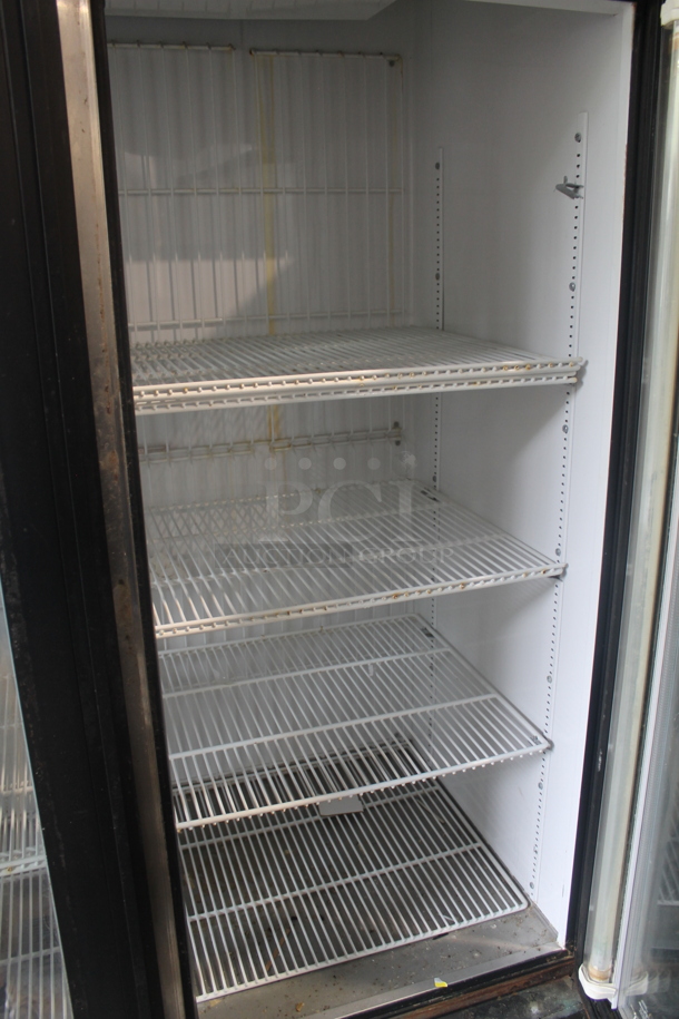 2012 True GDM-72F Commercial Three Swing Door Merchandiser Freezer With Polycoated Racks. 115/208-230V, 1 Phase.  - Image 6 of 7