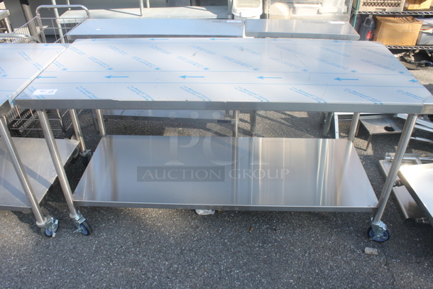 BRAND NEW! Vollrath Commercial Stainless Steel Work Table With Undershelf On Commercial Casters. - Image 1 of 3