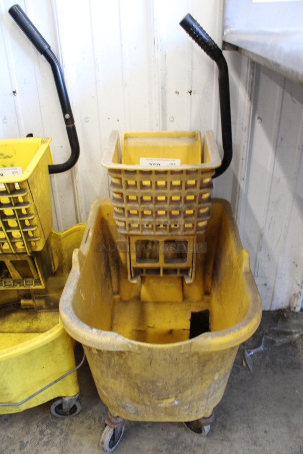 Yellow Poly Mop Bucket w/ Wringing Attachment on Casters. 15x22x36
