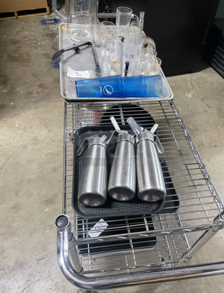 A lot of miscellaneous items, push cart not included