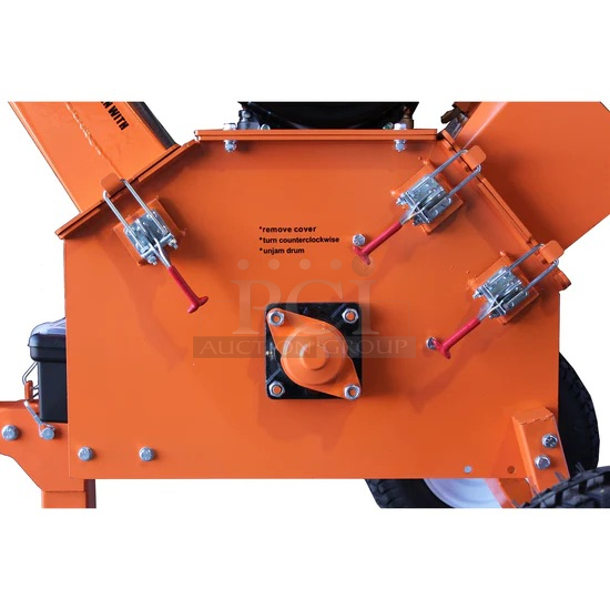 **THIS ITEM IS A LIGHTLY USED RETURN** Kohler PowerKing PK0915 5-Inch 14 HP Tow-Behind Chipper Shredder -. Serial Number: 5109803988. - Max Output: 14 HP at 3600 RPM - Blade Speed: 2530 RPM  - Principal axis rotation direction: counter-clockwise - Max. Chipping Capacity: 5.75 inches - Engine Type: Kohler 14HP CH440 OHV4-stroke - 
Towable with a toolless removable tow bar - Image 7 of 11
