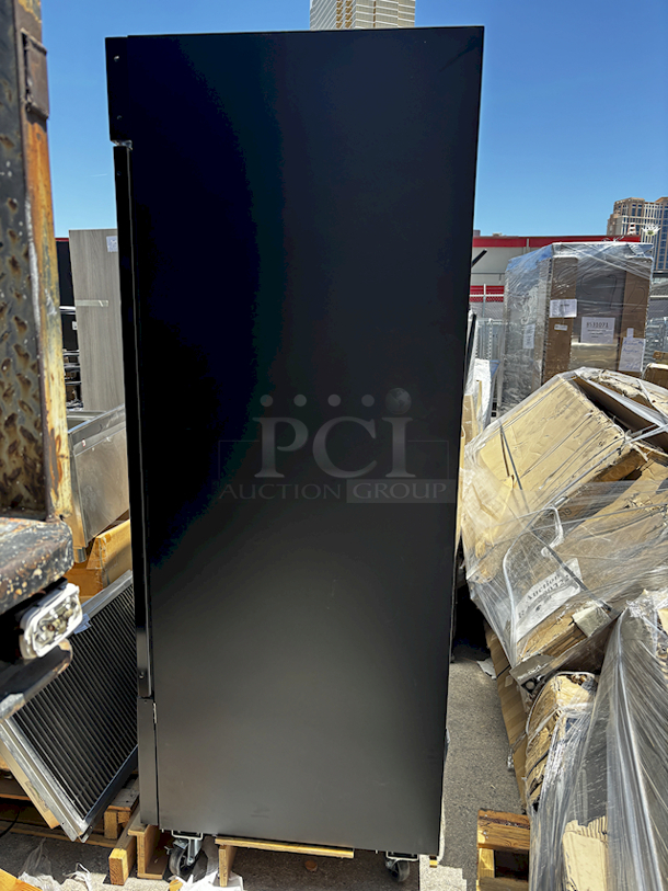 BRAND NEW SCRATCH & DENT! Avantco GDC-49F-HC 53" Black Swing Glass Door Merchandiser Freezer with LED Lighting. SN: 549884687. 115v Missing Power Cord. 53 1/8 x 31 7/8 x 83 7/8 Inches

 - Image 3 of 5